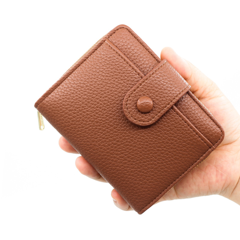 Nueva cartera transfronteriza de las mujeres simple patrón lychee cremallera monedero corto chica cartera al por mayor