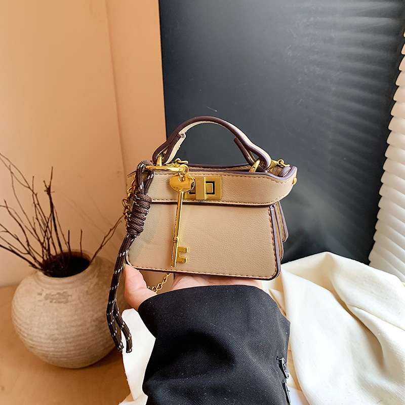 Coreano simple bolso de niña de color sólido mini bolso de bebé 2026 bolso para niños de comercio exterior transfronterizo
