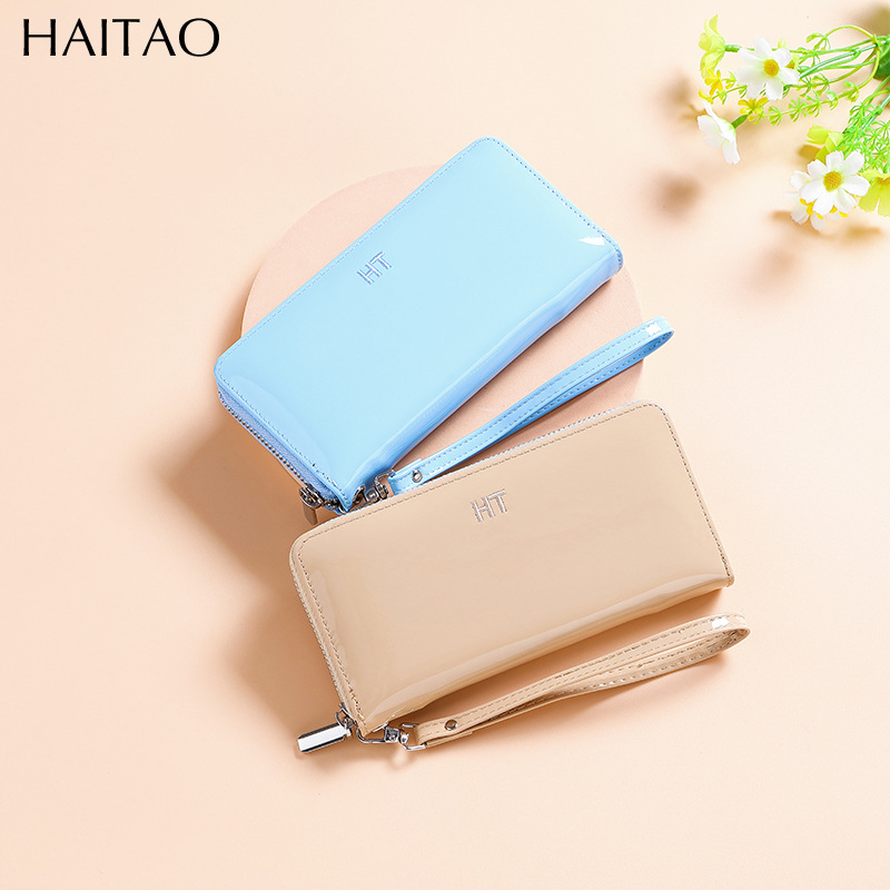 Bolso de pulsación de una sola mujer moda coreana zipper bolso de teléfono móvil esmaltado bolso de mano brillante bolso de tarjeta múltiple