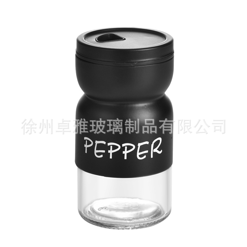 Botella de condimento transfronterizo de pimienta, sal y pimienta Botella de condimento redonda giratoria Combinación en blanco y negro Juego a prueba de humedad Tarro de condimento de vidrio