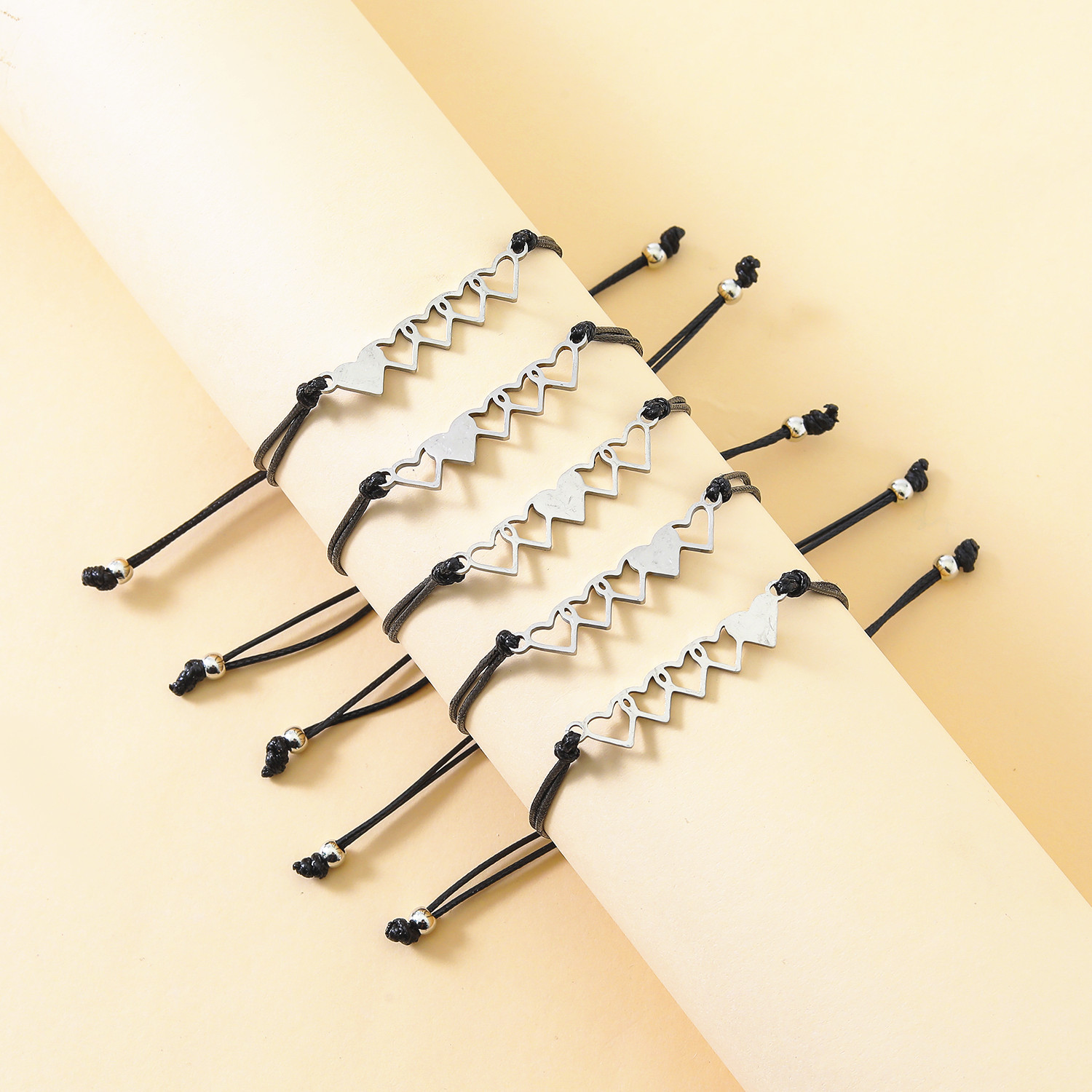 New Stainless Steel Heart-shaped Card Handmade Wax Thread Braided Bracelet 4-piece Set display picture 3