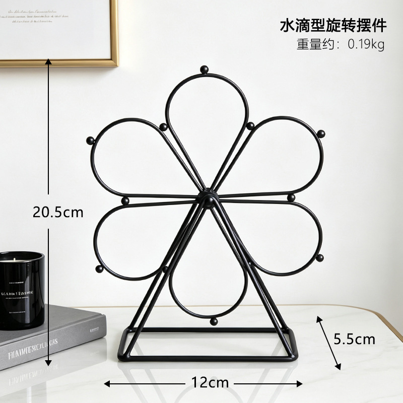 Black teardrop-shaped ferris wheel rotating ornament