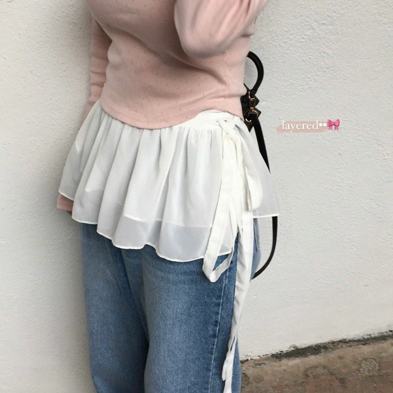 Корейская шикарная новинка 2025 года: многослойная юбка-миди в французском стиле с бантом и завязками на бедрах.