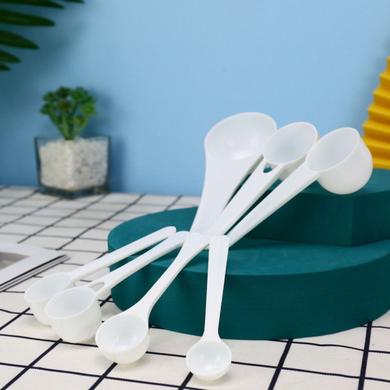 Cuchara pequeña de plástico desechable 1G 3G 5G 10g 15g 50g cuchara de embalaje independiente cuchara cuantitativa de leche en polvo