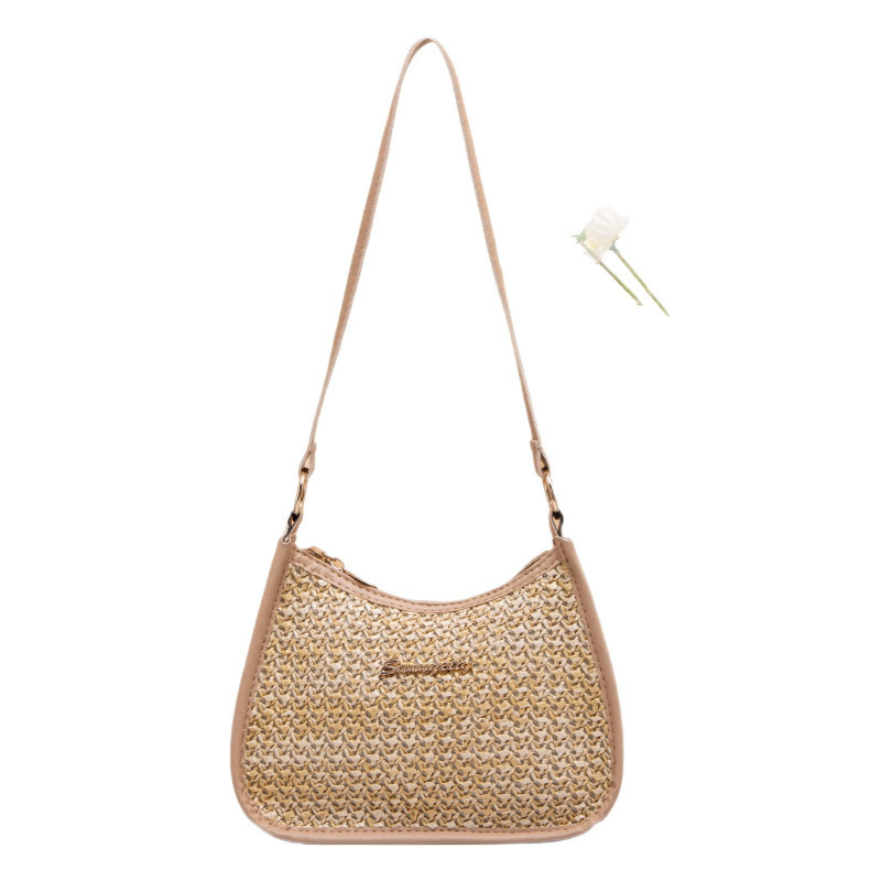 Fresco dulce 2025 nuevo bolso de paja de mujer, bolso de hombro de moda versátil, bolso de brazo de mujer nicho