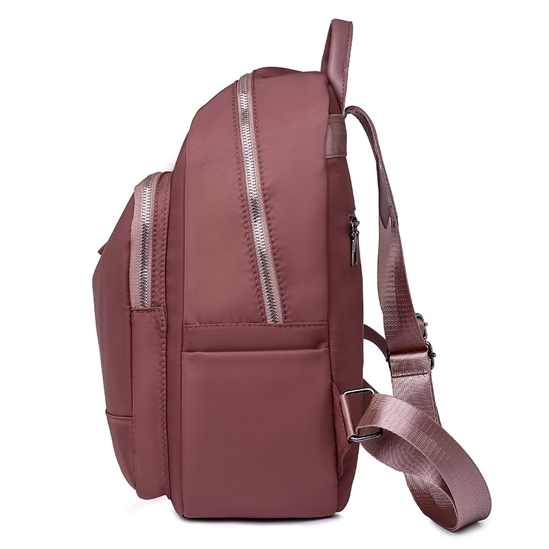 Fuente de origen 2023 nueva mochila Oxford para mujer coreana, mochila de viaje al aire libre de moda simple y versátil