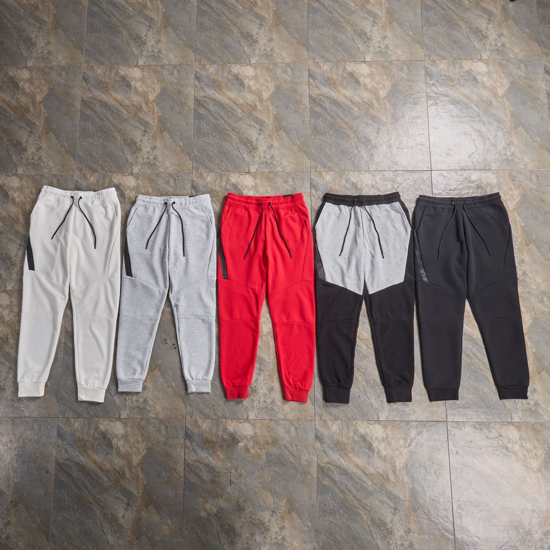 Pantalones deportivos pantalones de costura de primavera y otoño pantalones de ocio deportivo de algodón con capa de aire pantalones delgados con pies con cordón