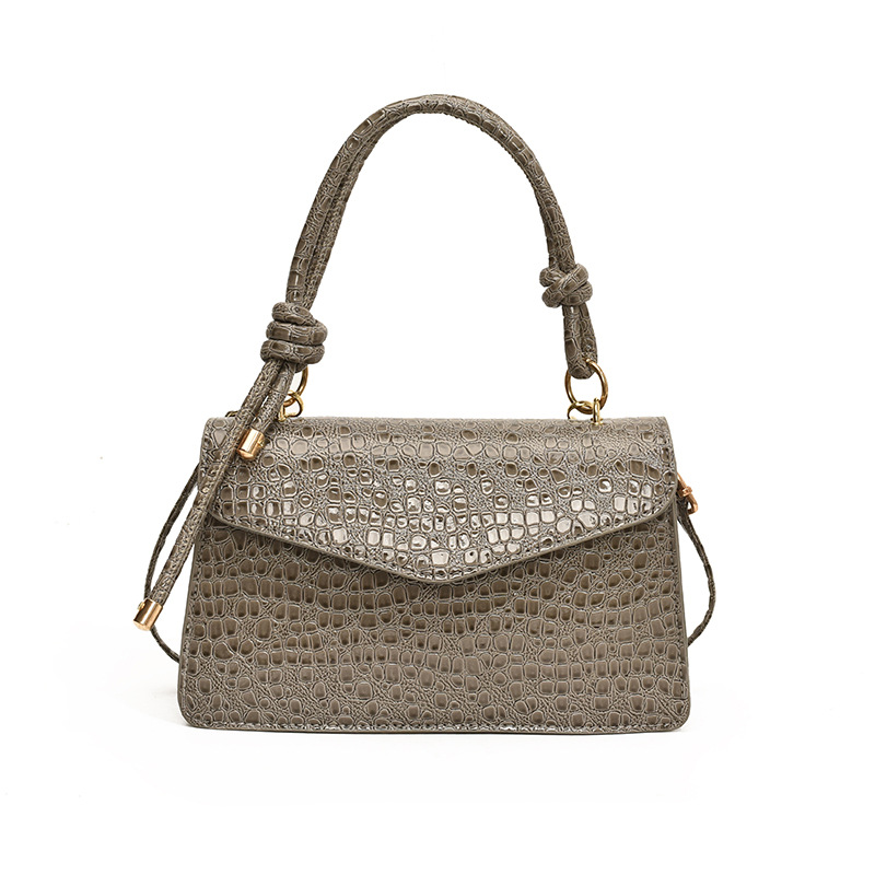 Cara brillante simple y elegante bolso coreano de nudo 2024, nuevo estilo extranjero, bolso de alto valor, bolso pequeño.