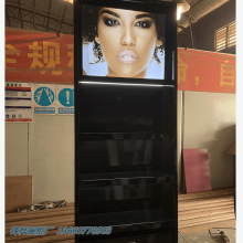 按客户店面尺寸做化妆品柜台组装旋转白色烤漆展柜