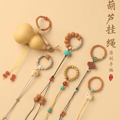 オリジナルの手作りの手を捻って縄をつるします。