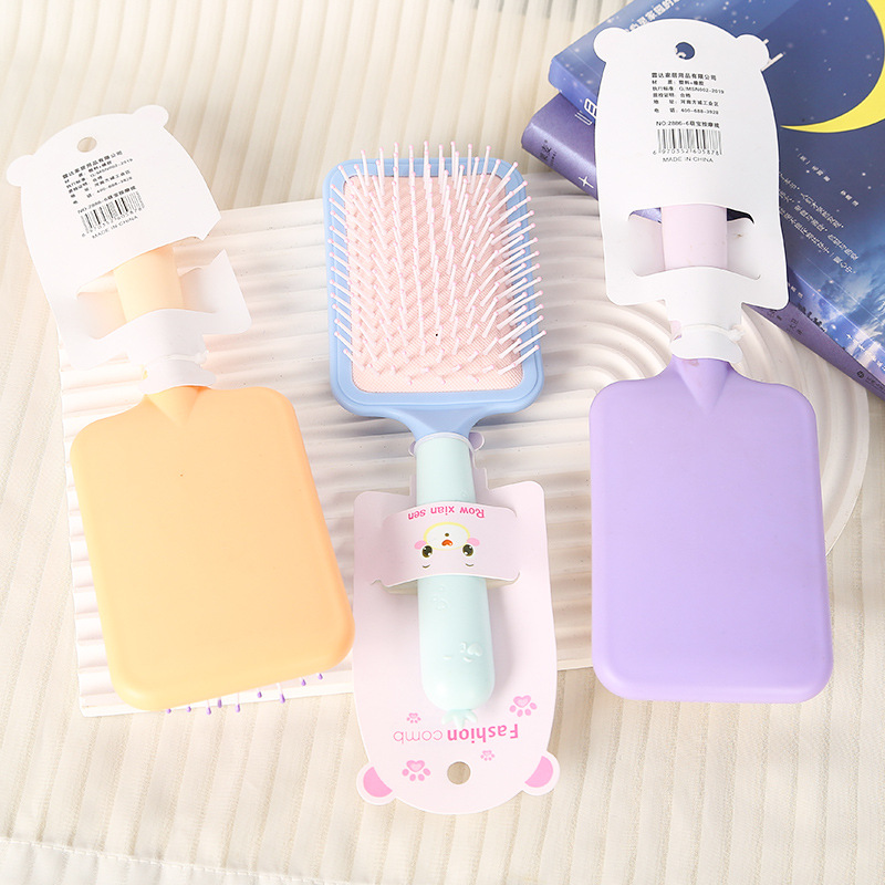 Nuevos productos de color caramelo cojín de aire peinado para niñas peinado de masaje portátil peinado de masaje airbag peinado de masaje