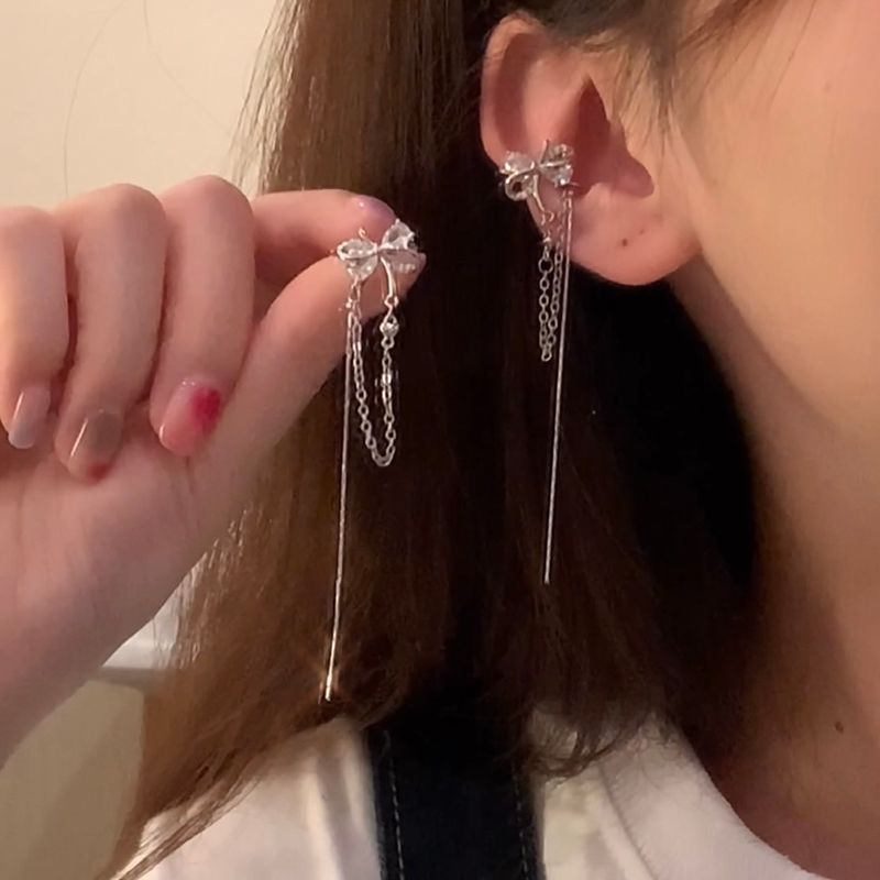 Arco de gama alta flash diamante borla larga oreja clip femenino verano diseño amor oreja hueso clip sin pendientes perforados moda