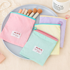 新しいシンプルなマカロンカラーのかわいい化粧品バッグ大容量小銭入れジュエリーバッグ女性の化粧品収納袋