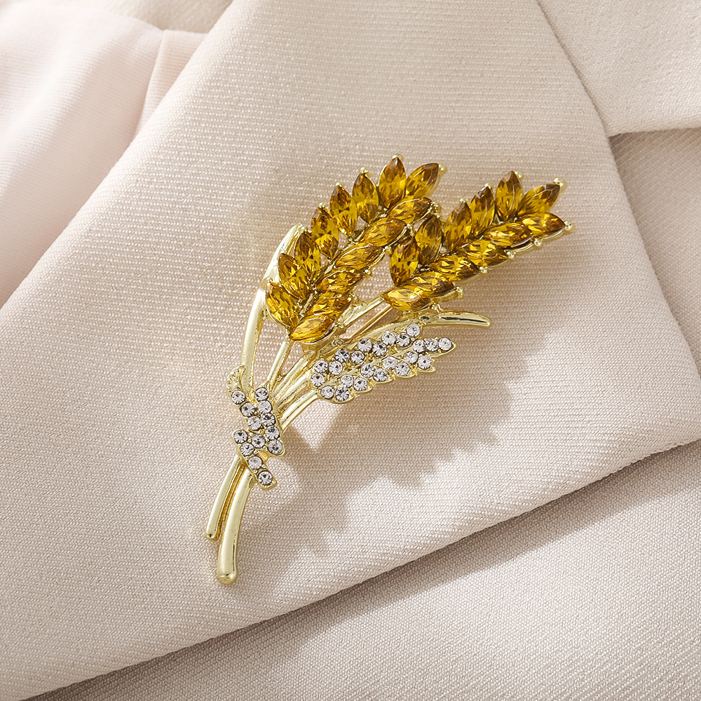 Golden elegant high-end demi-season brooch