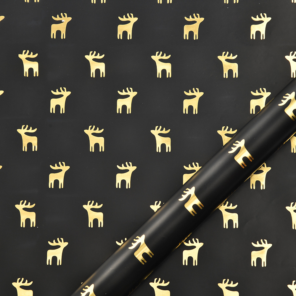 Nuevo papel de embalaje de Navidad estampado retro oro negro alce copo de nieve regalos de árbol de Navidad papel de regalo al por mayor
