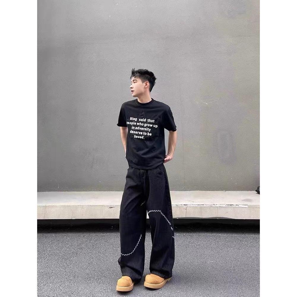 Jeans machete negro para hombres 2025 nuevo diseño bordado sensación de piernas largas sueltas pantalones casuales de moda