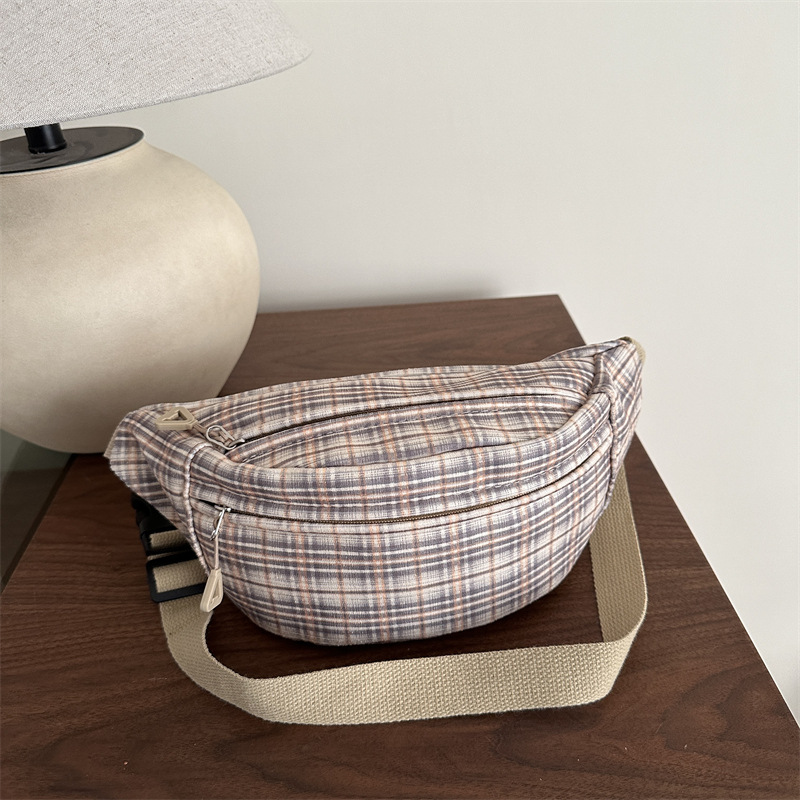 Moda coreana simple estilo extranjero bolso de mochila a cuadros mujeres 2025 primavera nuevo bolso de hombro suave bolso de pecho casual