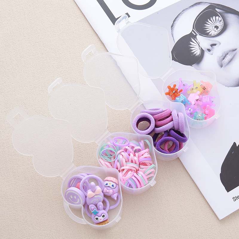 Caja de caricatura para niños anillo de cabello color macarón pequeño clip de agarre de alta elasticidad banda de goma desechable toalla anillo cuerda de cabeza