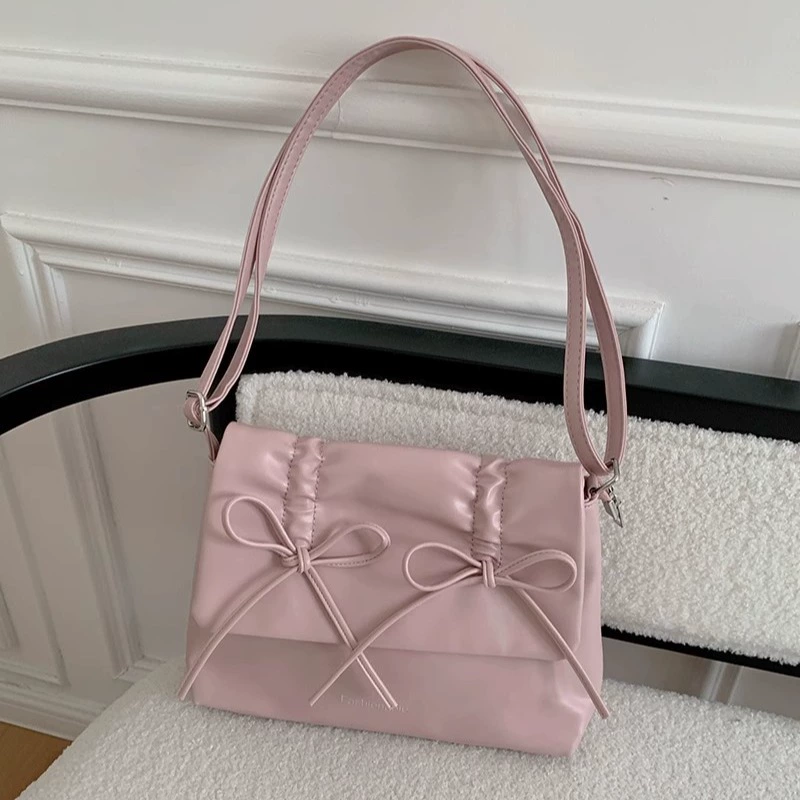 Cute fuchsia shoulder bag with bow, capacious one-shoulder bag