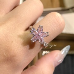 アマゾン速売通熱売回転可能粉ドリル桜指輪女性大衆デザインロマンチック花型ジルコン指輪