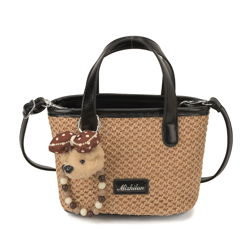 Bolsa de playa de moda coreana tejida, color extranjero, bolsa de hombro ligera y compacta para niños y niñas, nueva bolsa infantil transfronteriza.