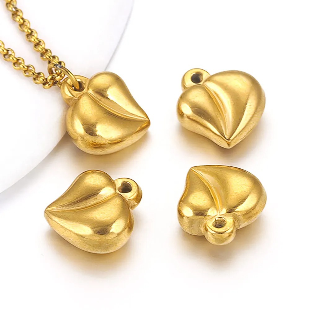 Colgante de corazón de acero inoxidable colgante de torsión sólido acero de titanio vacío accesorios de joyería de oro DIY corazón