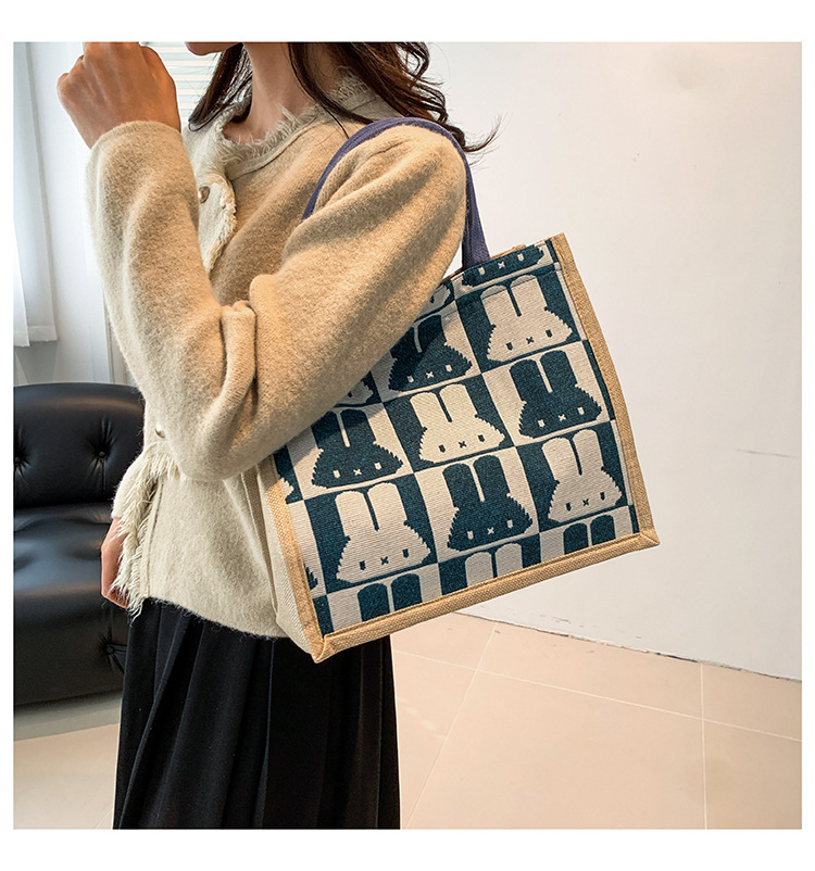 High-end mid-capacity canvas school commuting handbag 2024 new style fashionable and versatile linen single-shoulder tote bag undefined