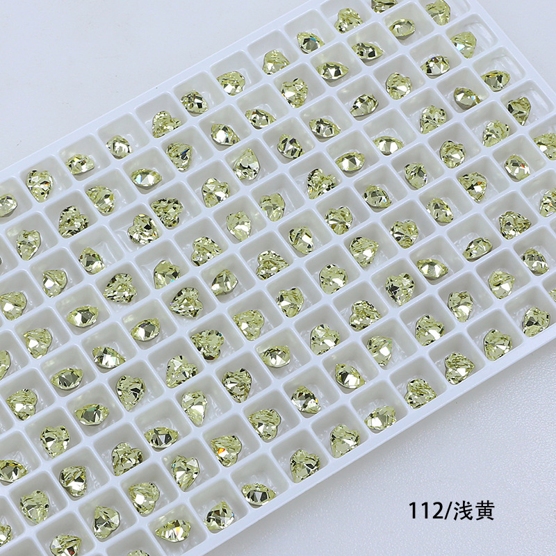 Dongzhou Crystal 6.5MM diamante de vidrio de fondo puntiagudo en forma de corazón de melocotón diamante de forma especial con fondo chapado en plata real