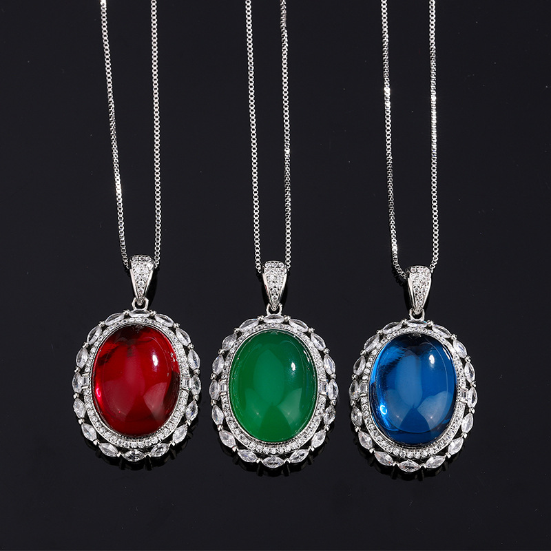 2024 nuevo estilo Zhuang Shengsheng joyería simulación paloma sangre rojo corindón cristal puntiagudo azul superficie lisa colgante retro maestro 15*20