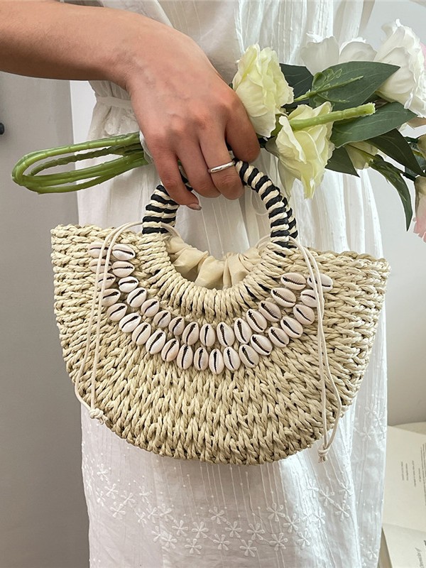 2026 nueva bolsa de tejido de paja de nicho de gran capacidad portátil bolsa de playa de playa bolsa de moda cesta de verduras bolsa de mujer