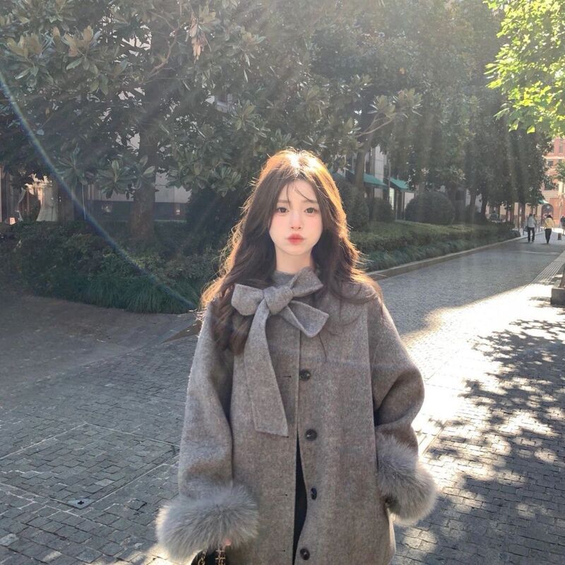 Korean Wholesale Retro Bow Woolen Outwear Autum New Small Age-Reducing Woolen Outwear with Fur Sleeves Korean Wholesale Retro Bow Woolen Outwear Autum New Small Age-Reducing Woolen Outwear with Fur Sleeves