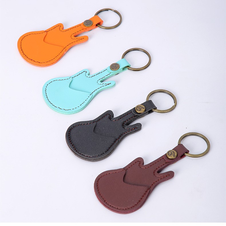 Pick clip Tipo de guitarra de cuero genuino de LA PU multi-color opcional portátil multi-función de ventas directas de la fábrica