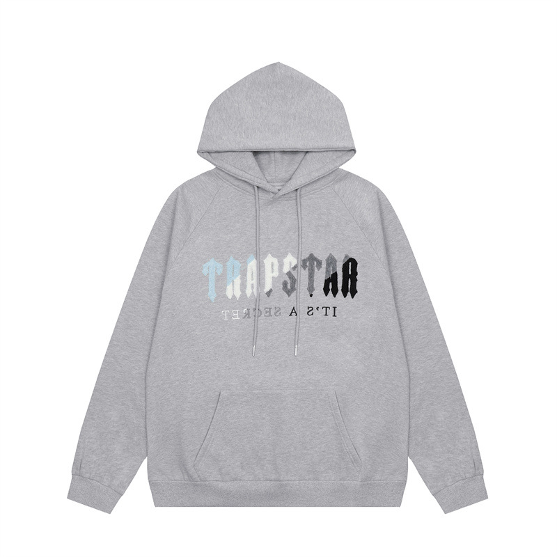 Trapstar marca de moda europea y americana azul, blanco, gris y negro bordado toalla forrado de lana hombres y mujeres pareja de alta calle traje de ocio
