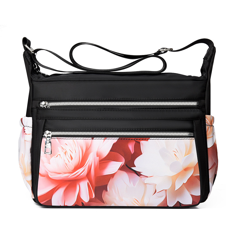 Bolso de hombro para mujeres de mediana edad bolso de la madre moda impresa casual tela de nylon de gran capacidad transfronteriza Venta caliente bolsa de mensajero para las mujeres