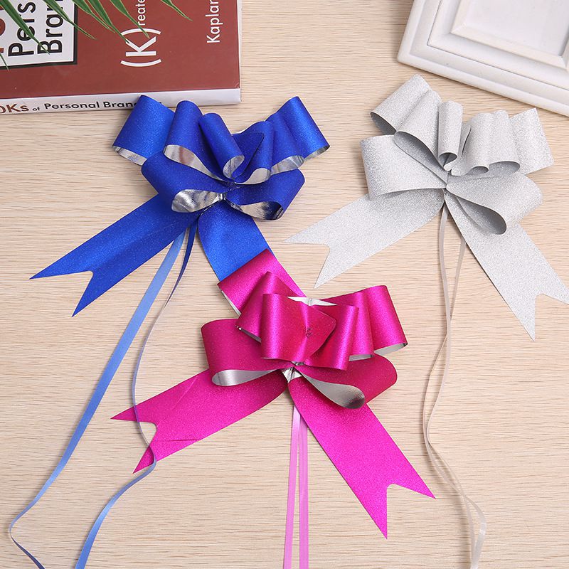 Cruz-frontera Venta caliente de alta gama de decoración del hogar de regalo de la flor embalaje arco mano tirar flor 50 cebolla colorida boda coche puerta tirar flor