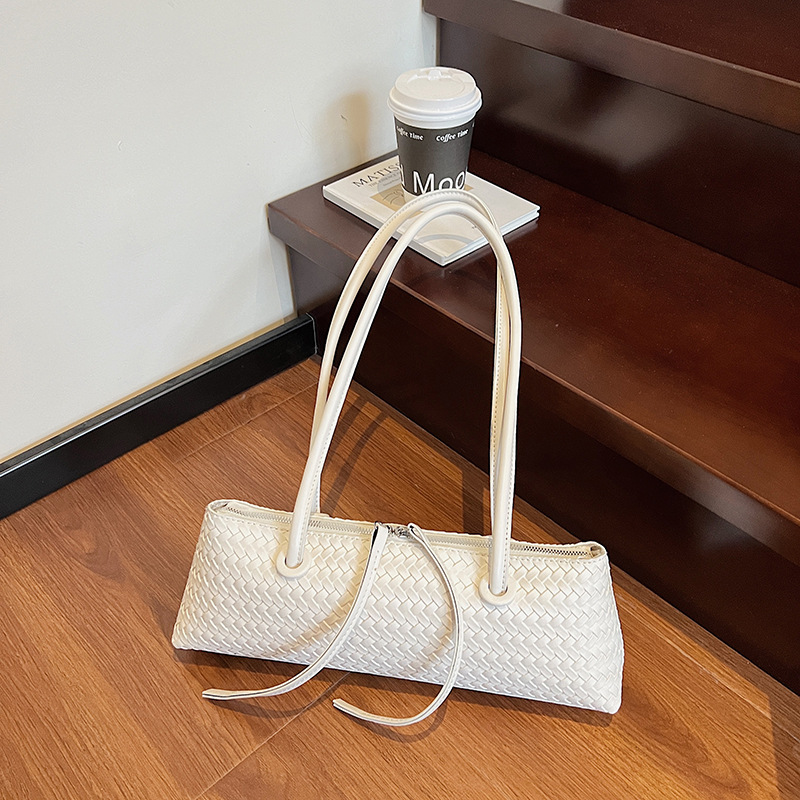 Bolso de axila de textura transfronteriza 2025 verano nuevo bolso femenino bolso tejido de moda bolso de hombro retro de gran capacidad