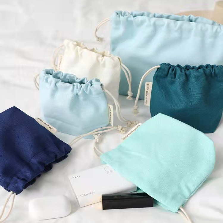 可手提纯色束口袋立体大容量耳机手机化妆包防尘便利袋收纳便携