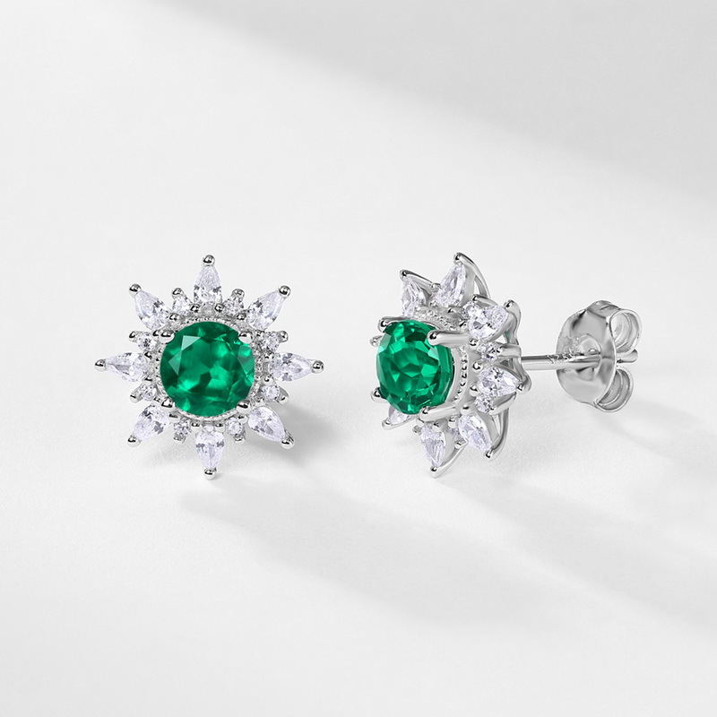 Especializado en Europa y América para el cultivo de lujo ligero retro, pendientes de esmeralda, pendientes de color flor de sol de plata S925, simples europeos y americanos