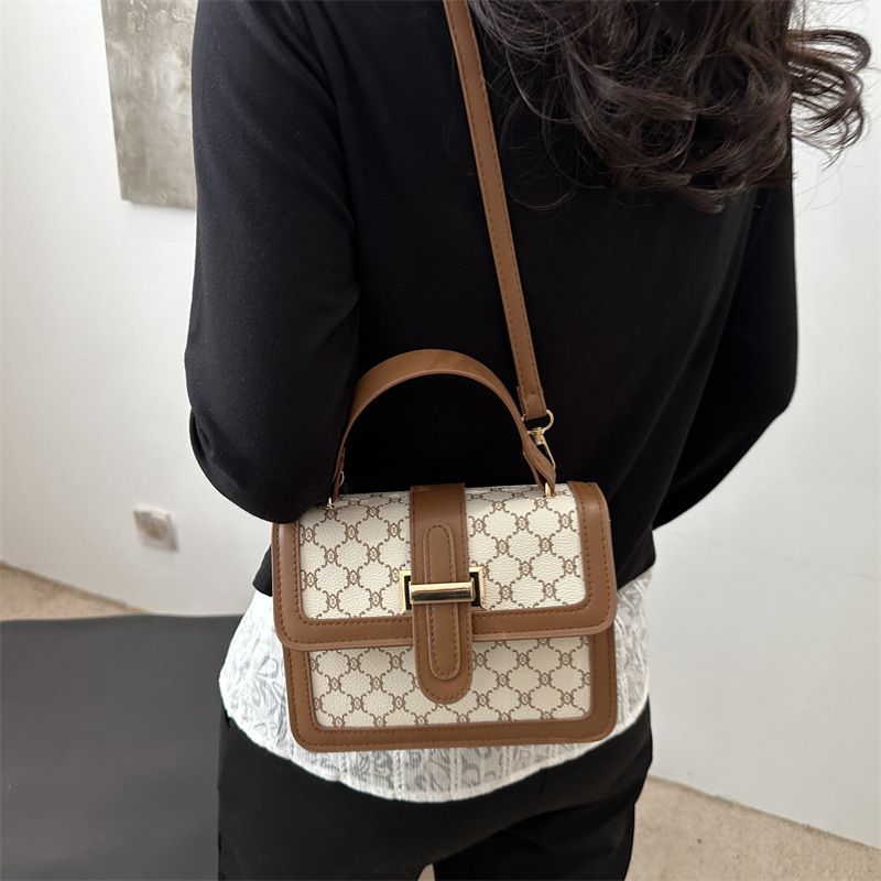 2025 nueva moda simple de alto valor de cara bolso de hombro de moda retrógrada impresión de personalidad bolso de viaje portátil pequeño