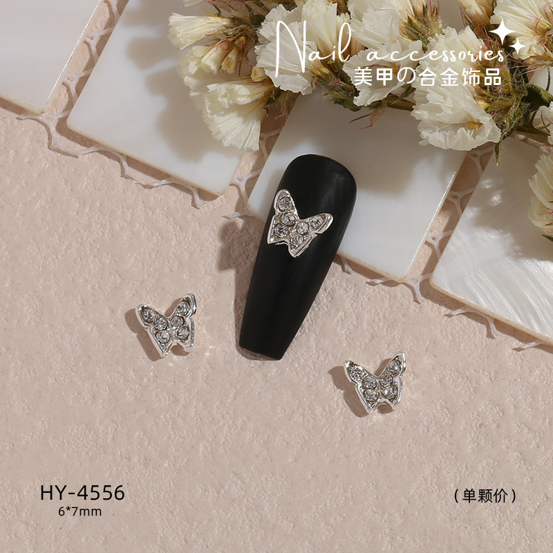Transfronterizo nueva manicura mariposa plata metal aleación plana estilo japonés Internet celebridad rhinestone DIY accesorios joyería al por mayor