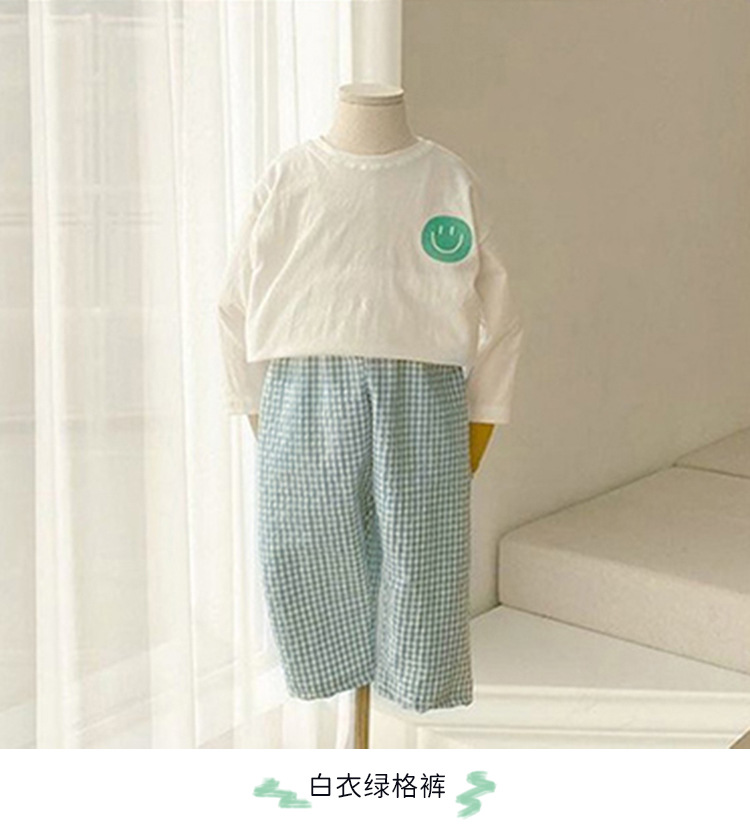 White shirt and green checkered pants.jpg