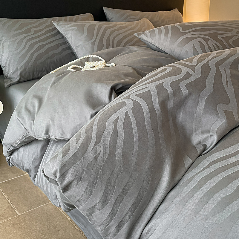 Cama de algodón de cuatro piezas 2025 nuevo estilo satén de lujo ligero algodón funda edredón sábana ropa de cama de tres piezas ropa de cama