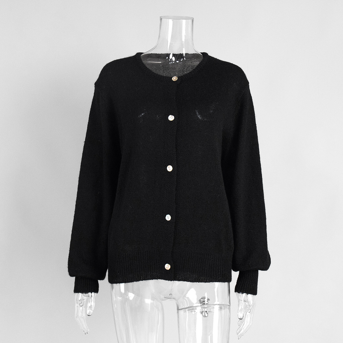 Cardigan de punto de color caramelo mujeres Europa y los Estados Unidos otoño y invierno 2025 cabello de cabello
