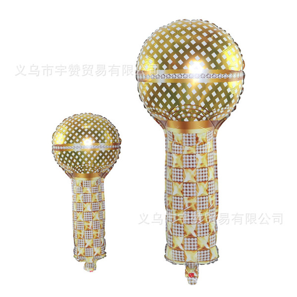 Big small golden microphone