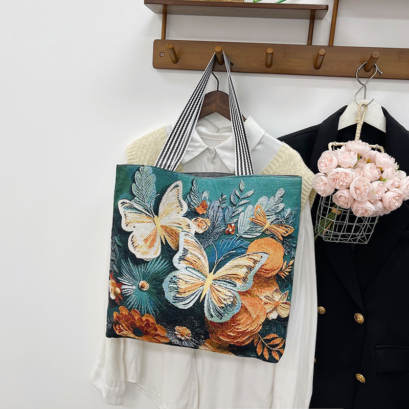 新しい女性のキャンバスポータブルショルダーバッグ漫画蝶織り刺繍シンプルな大容量ショッピングバッグ短距離旅行大型バッグ|undefined