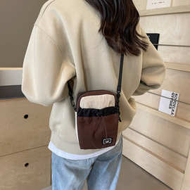 手机包女斜挎新款时尚百搭小包包迷你帆牛津单肩手提竖款零钱包潮