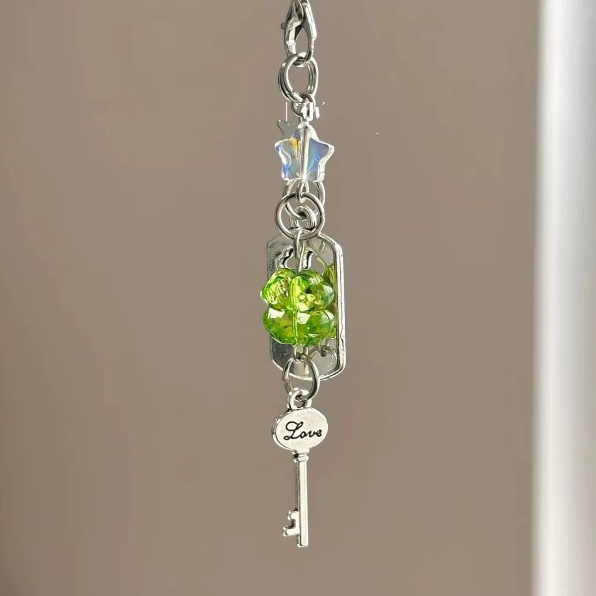 Brand mobile phone, strap, keychain, camera, pendant, handle, four-leaf clover