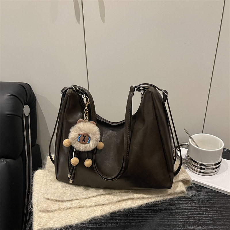 Bolsa de viaje retro de gran capacidad para mujeres 2025 nuevo ocio versátil bolso de hombro de doble uso mochila de hombro