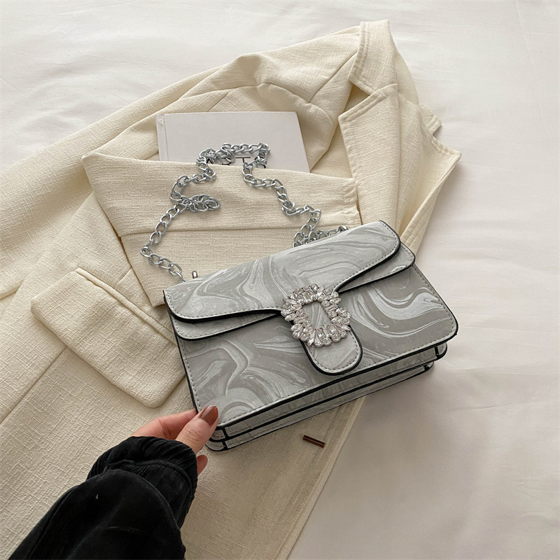 Moda simple temperamento coreano cadena de hombro bolso de mochila para mujeres 2024 primavera nueva bolsa de diamantes de estilo extranjero