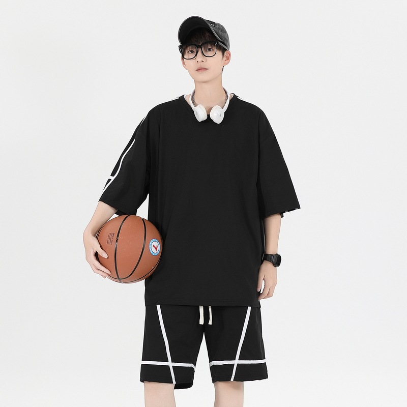 Fábrica de fuente personalizable logotipo de verano niño cuello redondo suelto camiseta de manga corta pantalones cortos trajes deportivos casuales para hombres